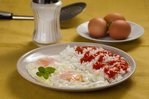Tasty fried eggs Stock Photos