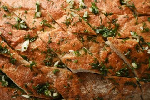 Tasty garlic bread texture background, close up Stock Photos