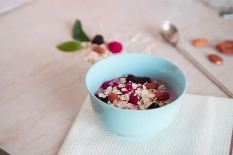 Tasty granola with fresh fruits and nuts Stock Photos