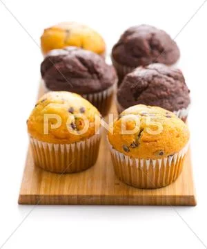 The tasty muffins with chocolate. Stock Photos