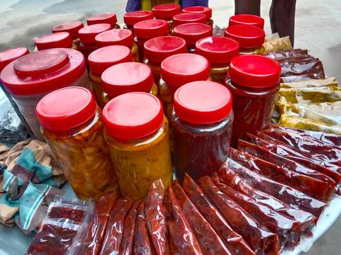 Tasty multiple pickles on plate Photos