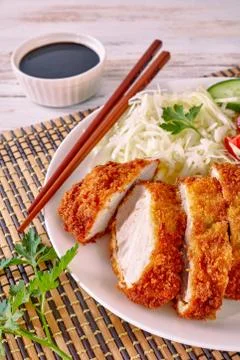 Tasty panko breaded deep fried pork cutlet Stock Photos