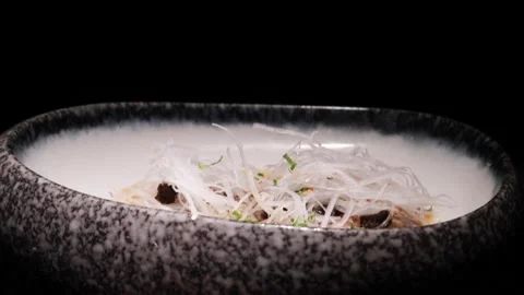 Tasty Peruvian dish Ceviche served in a ceramic plate Stock Footage 150890526
