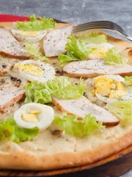 Tasty pizza Caesar close-up of the selected focus Stock Photos