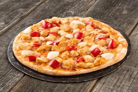 Tasty pizza on the old table Stock Photos