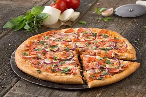 Tasty Pizza On The Old Table Stock Photos