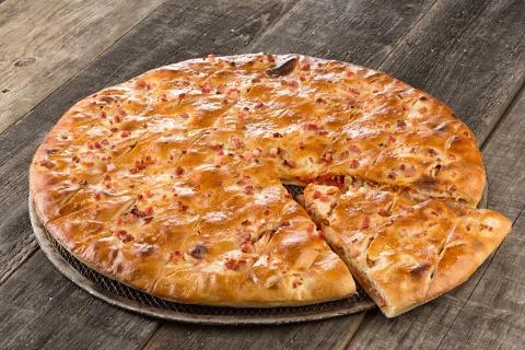 Tasty pizza on the table closed Stock Photos