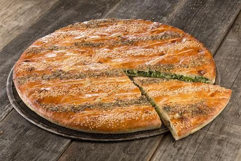 Tasty pizza on the table closed Stock Photos