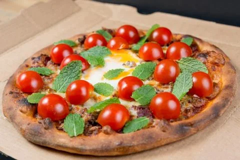 Tasty pizza on a the table Stock Photos
