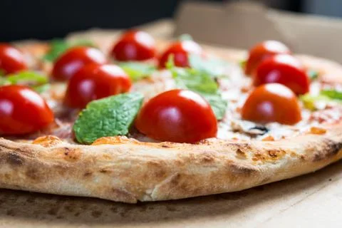 Tasty pizza on a the table Stock Photos