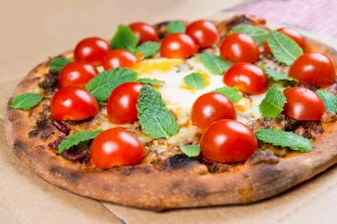 Tasty pizza on a the table Stock Photos