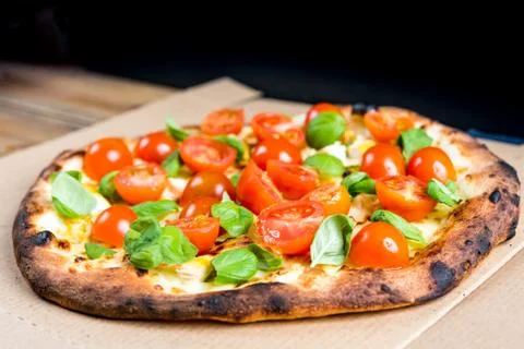 Tasty pizza on a the table Stock Photos