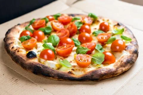 Tasty pizza on a the table Stock Photos