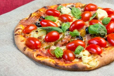 Tasty pizza on a the table Stock Photos