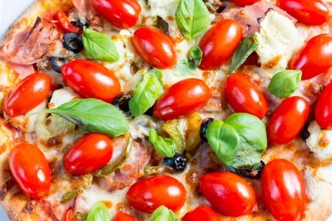 Tasty pizza on a the table Stock Photos