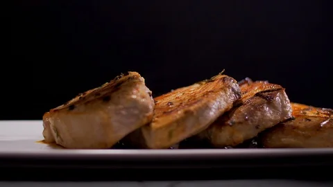 Tasty Pork Steaks. Pouring with Roasted Sauce Stock Footage