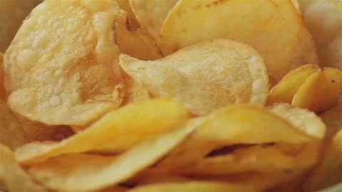 Tasty Potato Chips Rotating looping Stock Footage 80354915