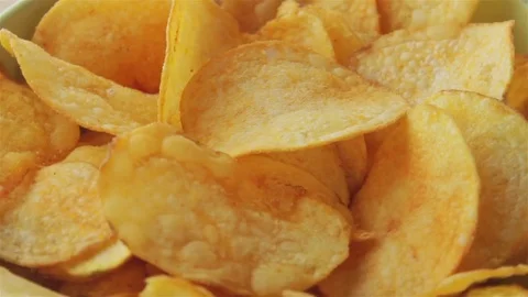 Tasty Potato Chips Rotating looping Stock Footage 80354940