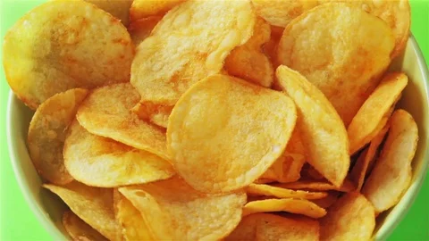 Tasty Potato Chips Rotating looping Stock Footage 80354976
