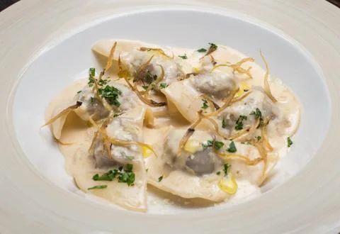 Tasty ravioli with parmesan Stock Photos