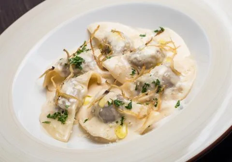 Tasty ravioli with parmesan Stock Photos