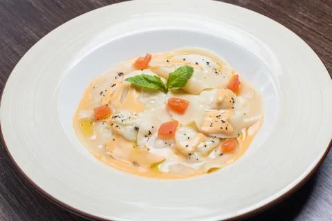 Tasty ravioli with parmesan Stock Photos