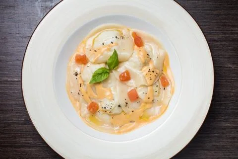 Tasty ravioli with parmesan Stock Photos