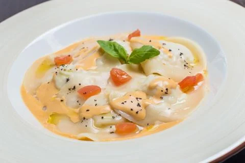 Tasty ravioli with parmesan Stock Photos