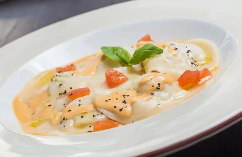 Tasty ravioli with parmesan Stock Photos