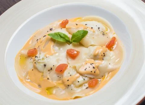 Tasty ravioli with parmesan Stock Photos