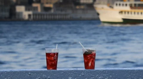 Tasty red tea with a lemon on a background of sea and ships Stockbeeldmateriaal 63044420