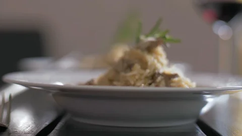 Tasty risotto with veal fillet prepared for two Stock Footage 106935225