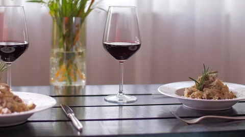 Tasty risotto with veal fillet prepared for two Stock-Footage 106935787