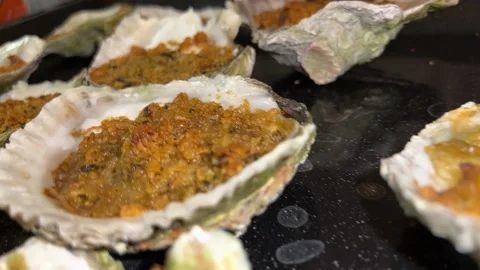 Tasty scallops cook on the table Video stock 230076554