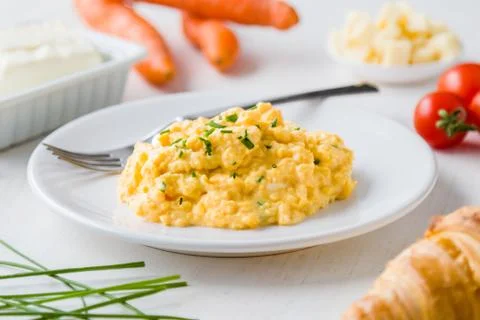 Tasty scrambled eggs Stock Photos