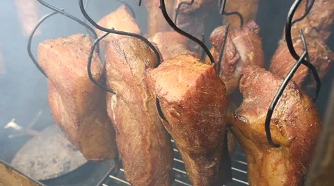 tasty smoked meat on hooks, slow motion , Stock Video