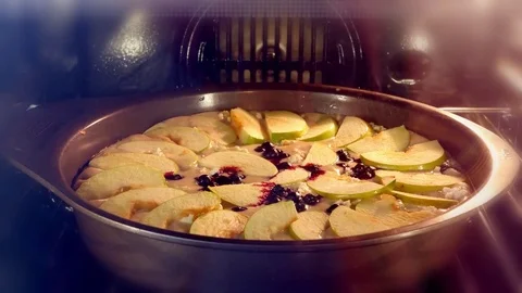 Tasty sweet apple cake, cooked in the oven, Titelapse,3840x2160, 4K Stock Footage