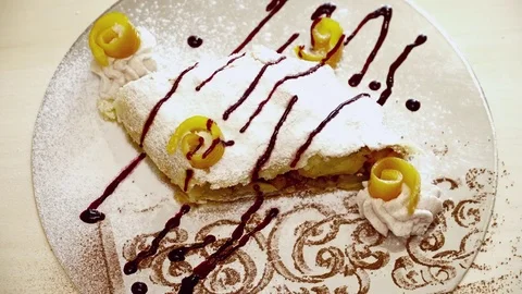 Tasty sweet strudel with the decoration closeup Stock Footage