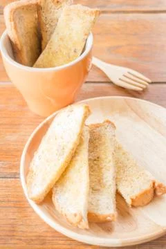 Tasty toasted multi grain bread with butter Stock Photos