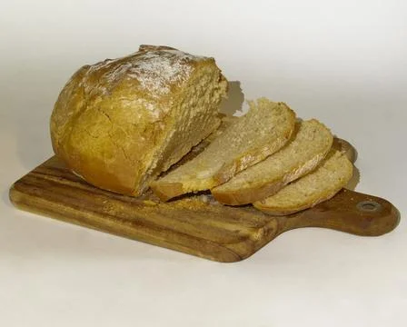A tasty white bread in a bread basket Stock Photos