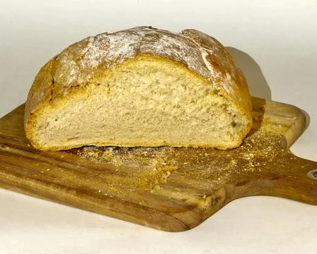 A tasty white bread in a bread basket Stock Photos