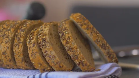 Tasty whole-grain bread on a black background 動画素材 109550327