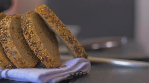 Tasty whole-grain bread on a black background 動画素材 109551193