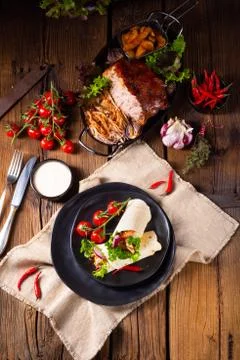 Tasty wraps filled with pulled pork and salad Stock Photos