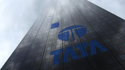 Tata Group logo on a skyscraper facade reflecting clouds. Editorial 3D rendering Stock Illustration