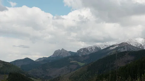Tatra mountain range wide landscape with snow peaks and forest valley Stock Footage 335128265