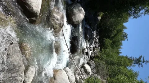 Tatra mountain stream with a strong current filmed vertically in Slovakia Stock Footage 203730658