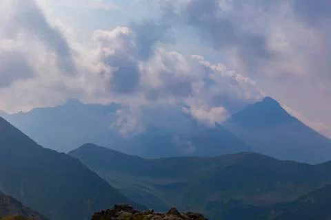 Tatra mountains in the clouds at sunset Stock Photos