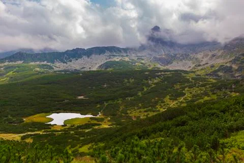 Tatra mountains in the clouds at sunset Stock Photos