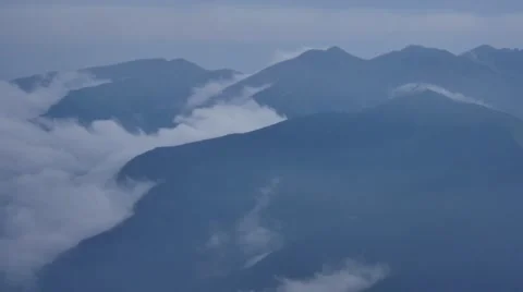 Tatra mountains in mist clouds from heli Stock Footage 58599103